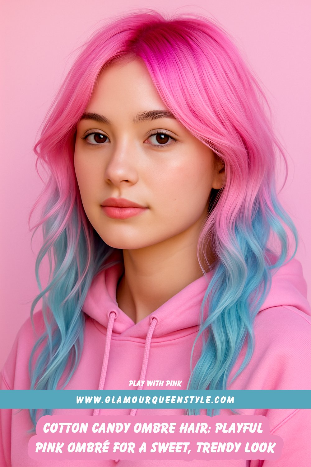 Person showcasing mid-length hair styled in cotton candy pink ombre; bright pink melts into pale pastel ends, complemented by luminous makeup and a trendy light-toned outfit.