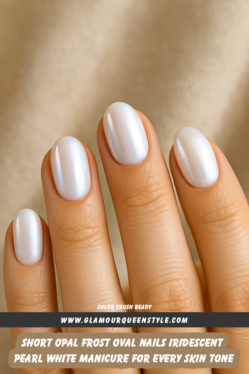 Close-up of hands featuring short, oval-shaped nails in an iridescent pearl white opal frost shade; nail color softly glows and complements all skin tones.