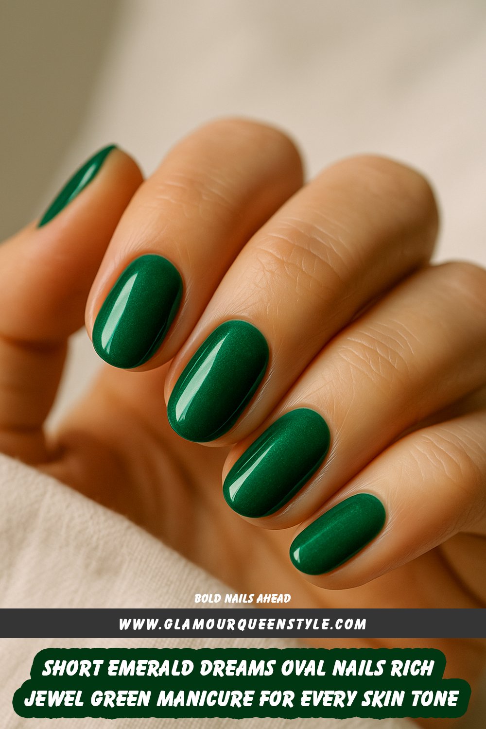 Close-up of hands featuring short, glossy emerald green oval-shaped nails; nail color stands out richly while harmonizing with various skin tones.