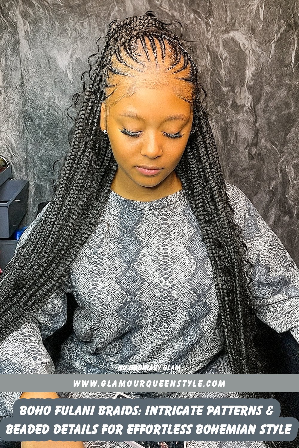 Woman wearing intricately patterned Fulani braids adorned with beads and cowrie shells; styled in flowing bohemian fashion celebrating cultural expression.