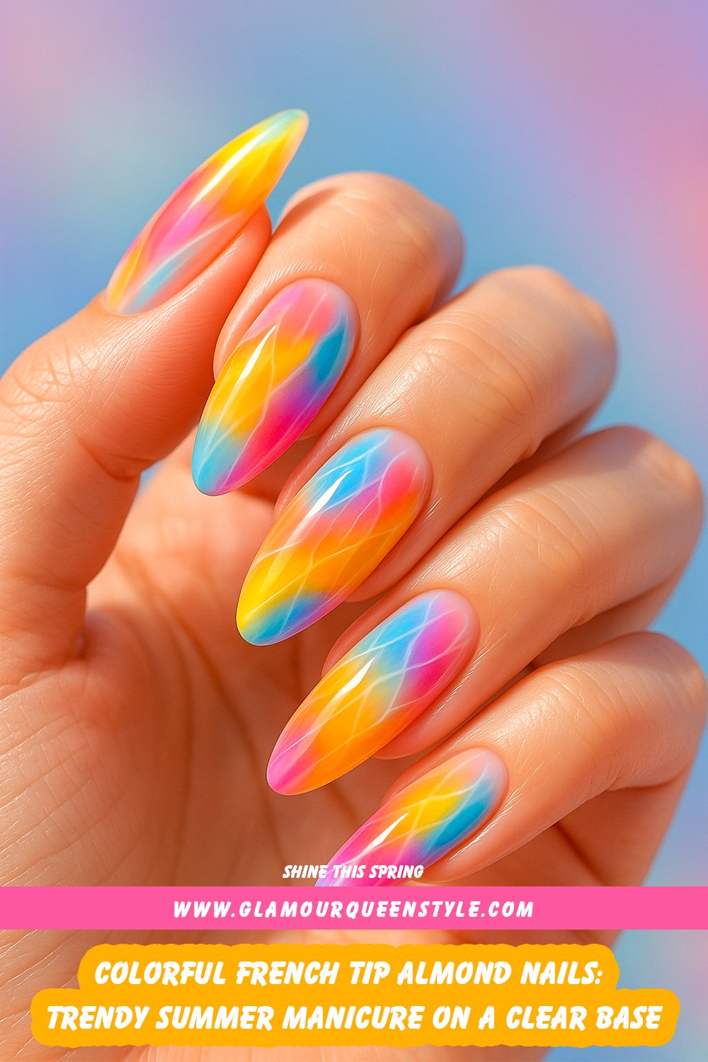 Short almond nails with a clear base and bright multi-colored French tips create a fun, glossy summer manicure.