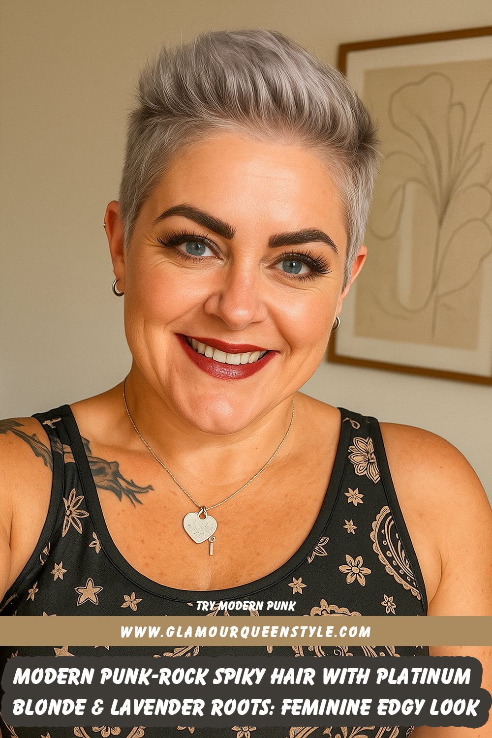 Close-up of short platinum blonde hair styled into soft spikes with lavender shadow roots; paired with minimal makeup and chic outfit.