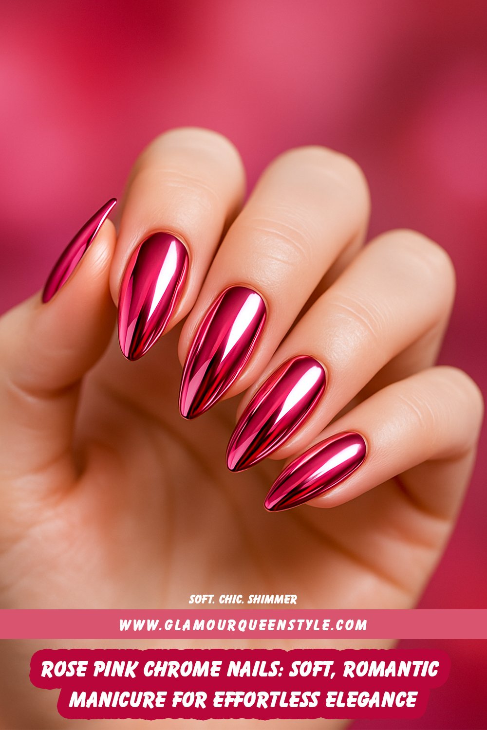 Close-up of almond-shaped rose pink chrome nails with a soft metallic glow; perfectly complementing natural skin tones for a delicate and elegant appearance.