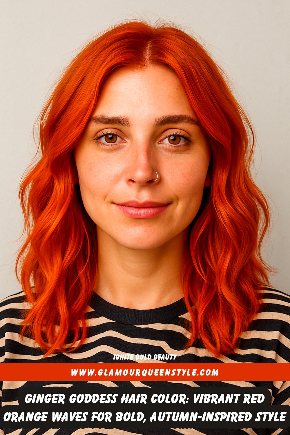 Vibrant ginger goddess hairstyle with red-orange tousled waves, styled with bronzed makeup and neutral fashion pieces.