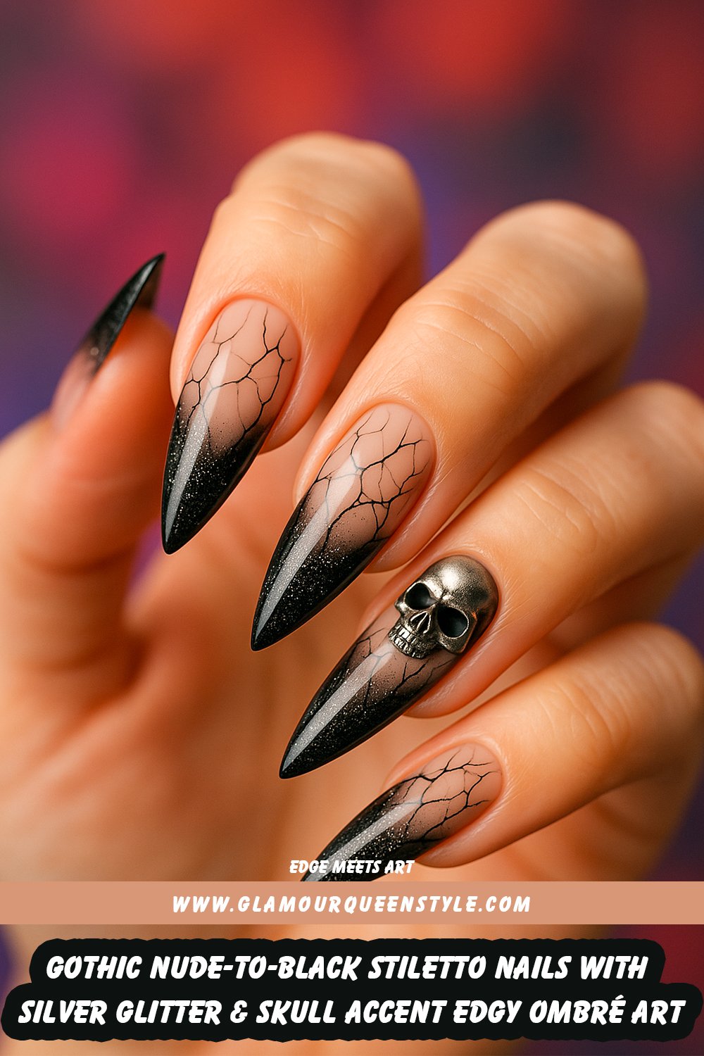 Long stiletto nails featuring a nude base fading smoothly to glossy black tips sprinkled with silver glitter; adorned throughout with fine black veins and crackle patterns plus one standout intricately designed skull accent—complementing all skin tones.